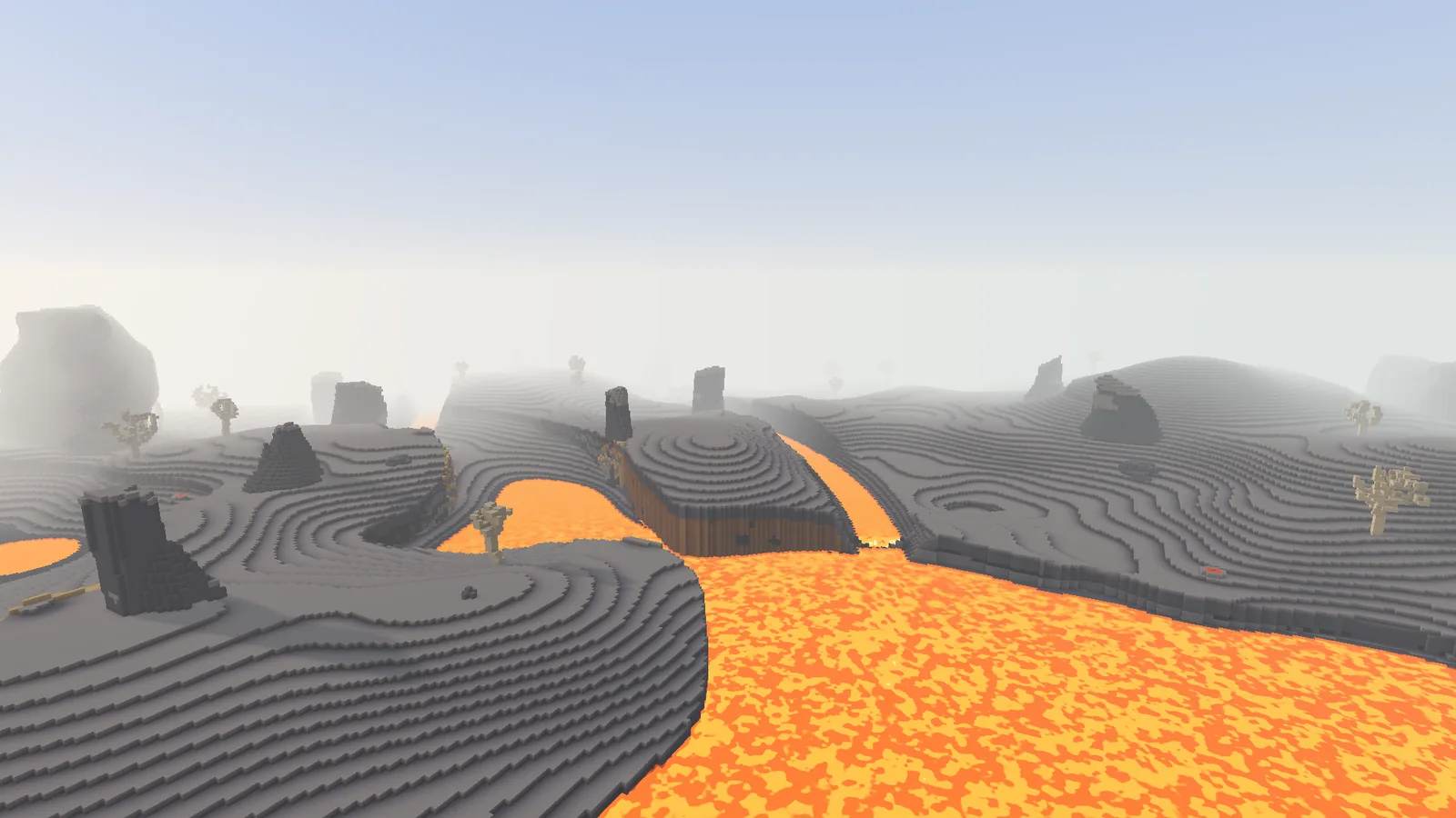 A river of lava runs through grey ash and black rock.