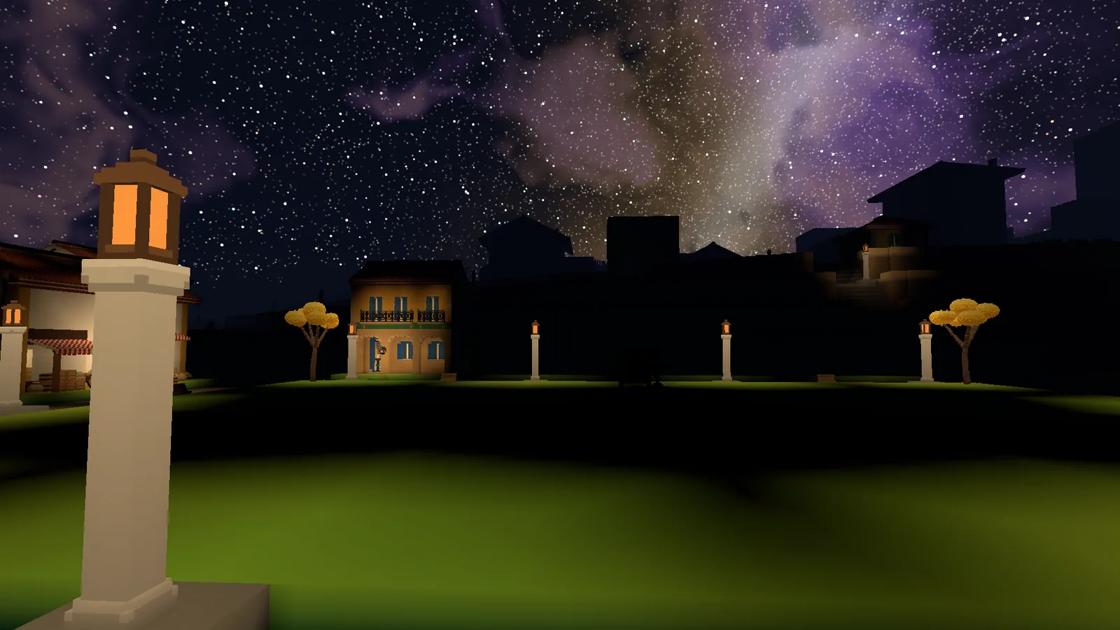 A town square at night under the Milky Way is lit only by its lamp posts and windows.