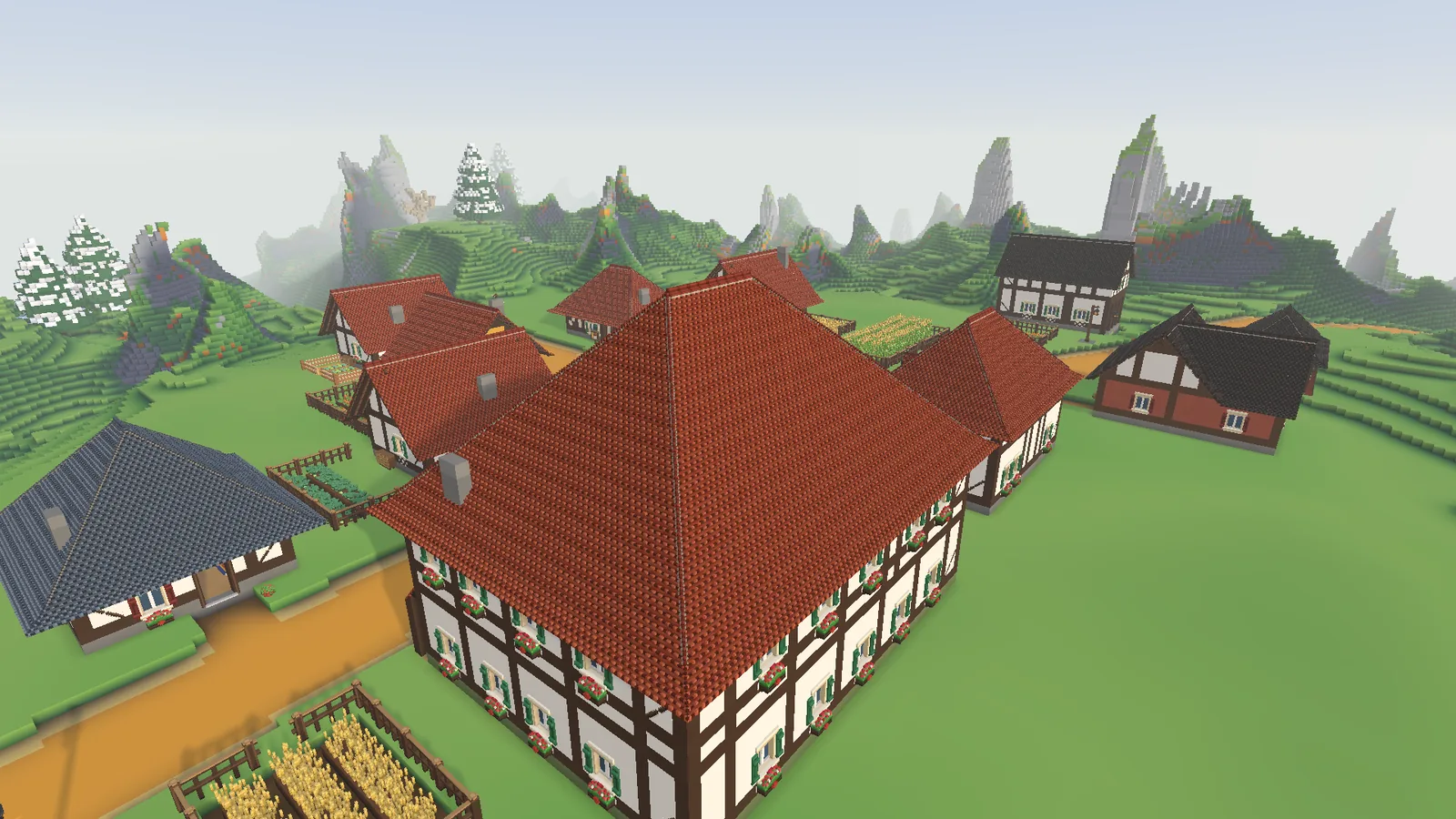 Half-timbered houses with red roofs stand before rock spires and snowy pines.